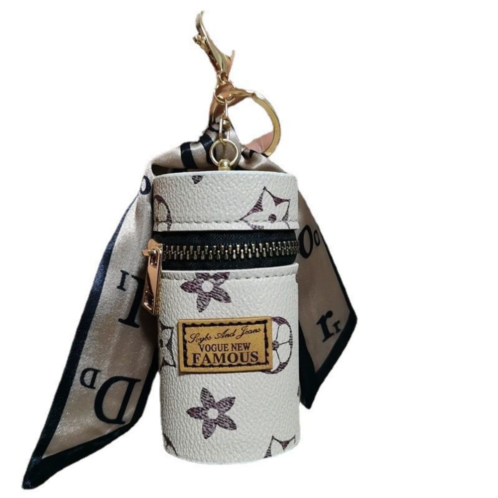 Monogram Keychain Leather - Astuccio cilindrico mini per rossetto Off-White